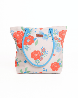 Floral-patterned bag with a visible brand label on a white background