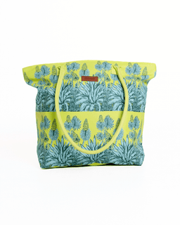 Tote bag with floral pattern and yellow accents on a white background