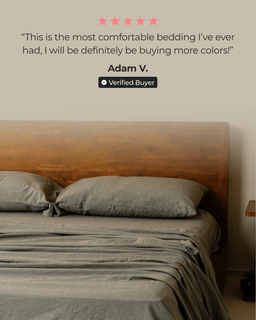 Bed with gray bedding and wooden headboard, featuring a five-star rating and customer review.