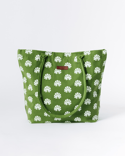 Green drawstring-style tote bag with an allover white shell print and rounded handles.