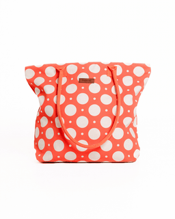 Polka dot bag with a visible brand logo on a white background