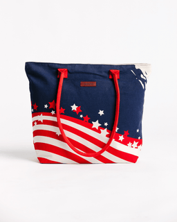 Navy blue tote bag with American flag design on a white background