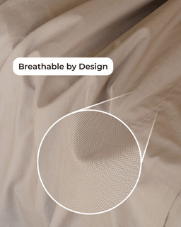 Close-up of beige fabric with a magnified section showing texture, labeled 'Breathable by Design'.