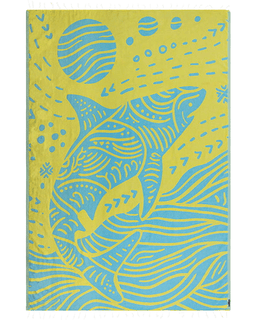 towel with a shark design on a yellow and blue background