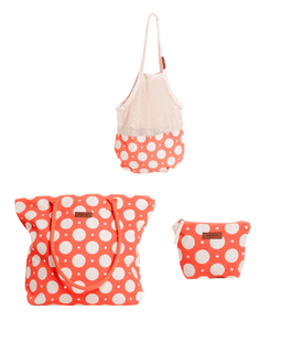 Three-piece fabric accessory set featuring a tote bag, a shoulder bag, and a small pouch, all in a coral orange and white polka dot pattern with solid cream upper sections, shown on a plain white background.