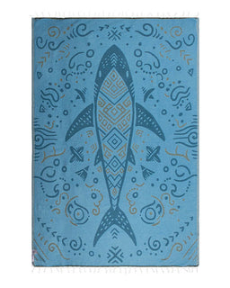 Decorative towel with a shark design on a blue background