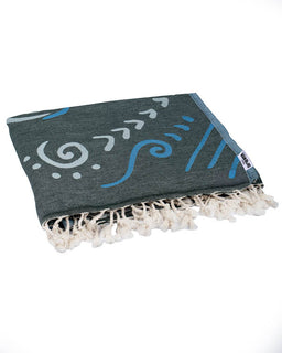 Gray towel with white and blue patterns on a white background