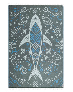 Gray towel with a shark design and abstract patterns on a white background