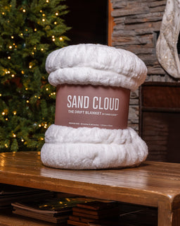 Drift Blanket sitting on a table with a sleeve