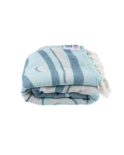 Folded striped towel with tassels on a white background