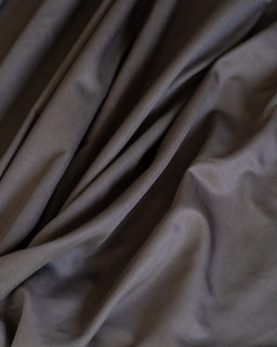 Close-up of gray fabric with folds