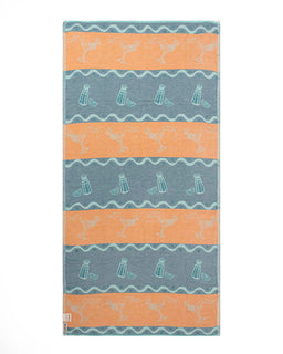 Striped towel with cocktail and bottle patterns on a white background