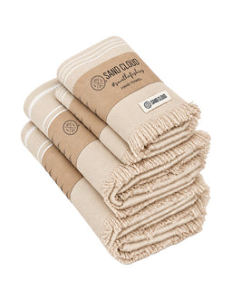 Four pack sand striped towel bundle on a white background