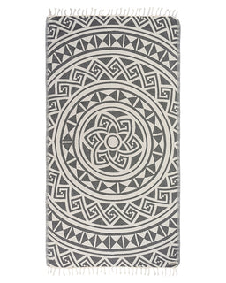Gray and white patterned towel with fringes on a white background