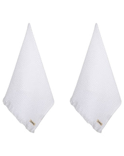 white micro waffle hand towels on white background