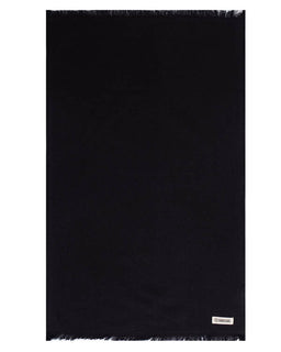 A black rectangular hand towel with fringed edges, shown flat against a white background. A small white brand label is visible in the bottom right corner.