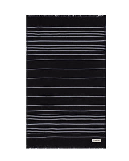 A black rectangular hand towel with thin horizontal white stripes and fringed edges, featuring a small white brand label at the bottom right.