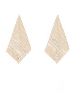 Two beige cotton bath towels with thin white diagonal stripes, displayed flat against a solid white background.
