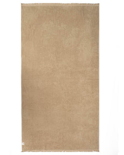 A rectangular beige towel with fringed edges, displayed flat against a white background.