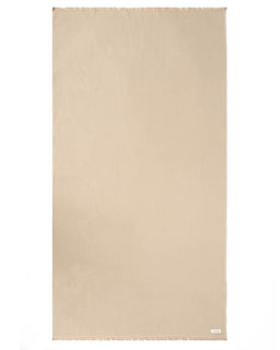 A solid beige rectangular bath towel with fringed edges, displayed flat against a clean white background.