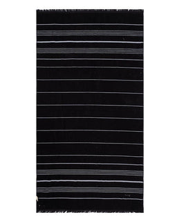 A rectangular black bath towel with thin, horizontal white stripes and fringed edges on all sides, shown flat against a white background.
