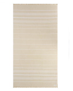 A beige cotton beach towel with thin white horizontal stripes, featuring fringed edges on the top and bottom, shown flat against a white background.