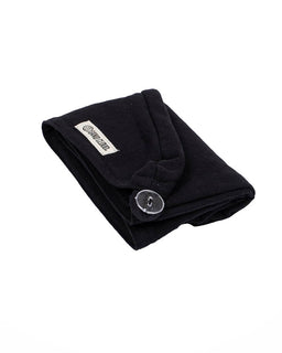 Black hair towel on a white background