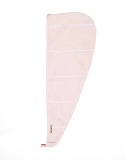 A light pink hair towel with thin white horizontal stripes and a small brown logo near the bottom, shown on a plain white background.
