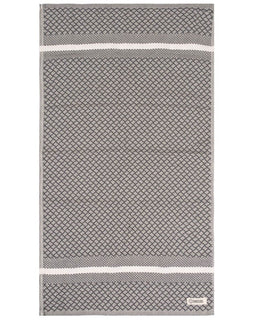Diamond patterned towel on white background