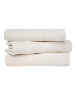 natural color stack of towels on white background