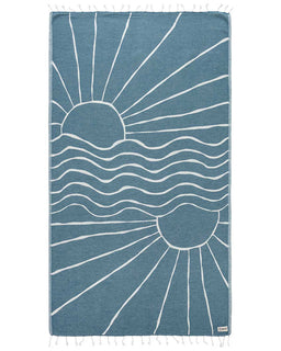 Blue towel with white sun and wave design on a white background