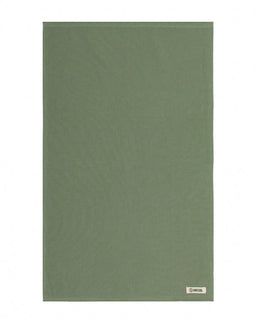 Green fabric swatch with a brand label on a white background