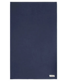 Navy blue towel with a brand label on a white background