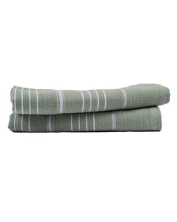 Two green striped towels stacked on a white background