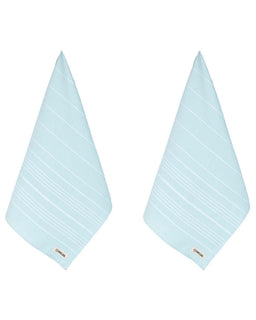 Light blue bath towels  on a white background