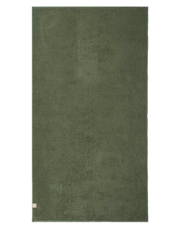Green towel on a white background
