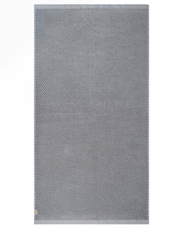 Gray textured towel on a white background