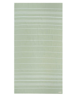 Green towel with white stripes on a white background