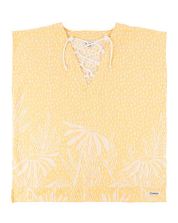 Yellow cover up with white floral pattern on a white background