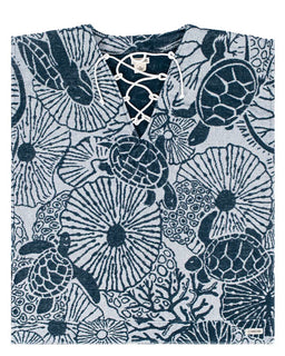 Cover up with turtle and coral pattern on a white background
