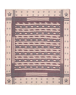Woven towel with star and stripe pattern on a beige background