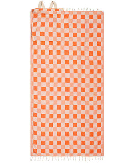 Checkered towel with orange and white pattern on a white background