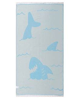 Towel with shark designs on a light blue background