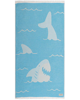 Towel with shark and wave pattern on a blue background