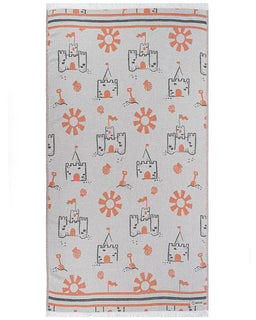 Towel with castle and sun pattern on a light gray background