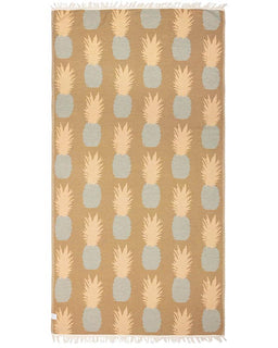 Beige towel with pineapple pattern on a white background