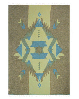 Rug with geometric pattern in green and blue on a plain background