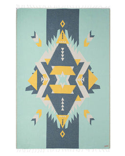 Geometric patterned blanket with triangles on a teal background