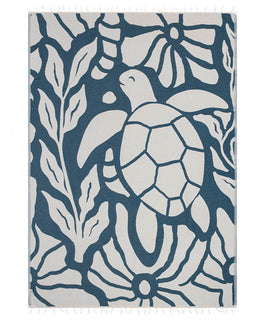 Towel with turtle and leaf pattern on a white background