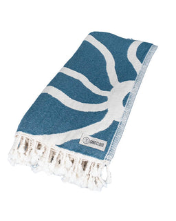 Blue and white patterned towel with tassels on a white background